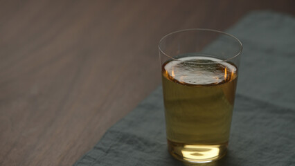 Wall Mural - apple cider into tumbler glass with copy space