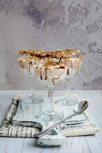 Cottage Cheese Milk Mousse With Chocolate Chips In Glasses On A Gray Concrete Background. Vertical, Close-up