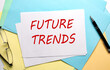 © Iryna - FUTURE TRENDS text on paper on the colorful paper background
