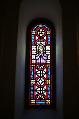 Wall Mural - stained glass window in church