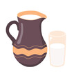 Dairy ceramic jug with a glass of milk .