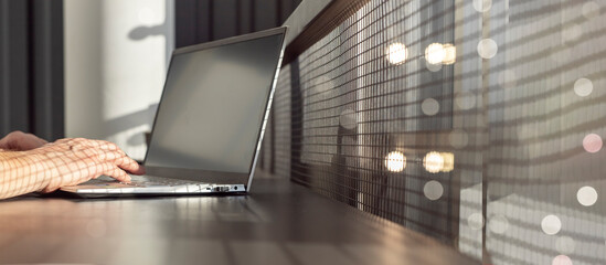 Poster - Banner with woman hands typing on laptop keyboard on window background. Place for text. Online education or freelance work concept. High quality photo