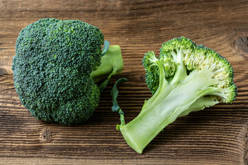 Wall Mural - Fresh broccoli on the wooden table