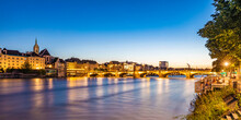 Switzerland, Basel-Stadt, Basel, Long Exposure Of River Rhine At Dusk With Middle Bridge In Background