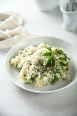 Canvas Print - Traditional Italian risotto with green pea