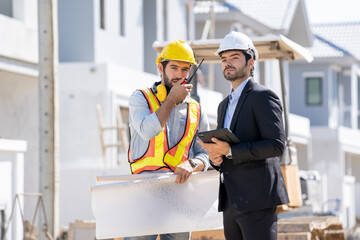 Aufkleber - Engineers discussion with consultants about detail of building plans for new home at construction site,Engineering construction teamwork concept.