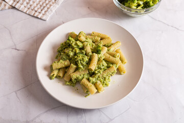 Wall Mural - Creamy macaroni pasta with cheese and broccoli. Quick and easy vegetarian recipe