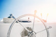 © Parilov - Modern boat steering wheel on luxury yacht with sunlight. Concept banner sea travel