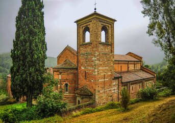 Wall Mural - Vezzolano Abbey is an outstanding architectural complex of medieval Piedmont. Of particular interest is the arcade partition in the central nave of the basilica with reliefs of the 12th century.  