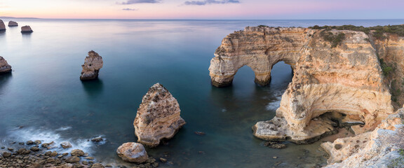 Wall Mural - Coastal view from Praia da Marinha beach of Algarve region in Atlantic ocean of Portugal, Europe