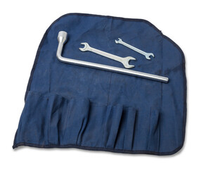 Wheel wrench and transportation hook on a blue cover for car repair on the road in the absence of insurance on a white isolated background.