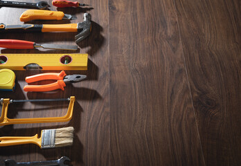 Wall Mural - Work tools on the wooden background.