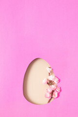 Wall Mural - Paper cut Easter egg with cherry blossom branch. Copy space for greeting with Easter day. Minimalistic design