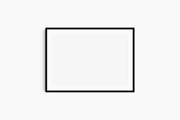 Horizontal frame mockup 7:5, 70x50, A4, A3, A2, A1 landscape. Single black frame mockup. Clean, modern, minimalist, bright. Passepartout/mat opening in 3:2 aspect ratio.