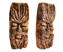 Isolated Photo Of Fantasy Face Ancient Pagan God Totem Idol Carved In Wood On White Background.