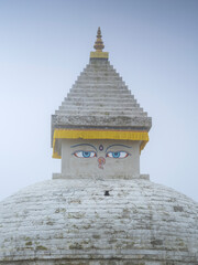 Wall Mural - Close up view to Buddha stupa in foggy day in Nepal