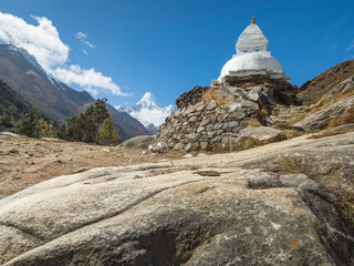 Wall Mural - wide angle view to white buddha stupa in nepal