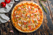 Mexican Pizza With Chicken And Jalapeno On Old Wooden Table Top View