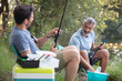 © auremar - father and son sat fishing