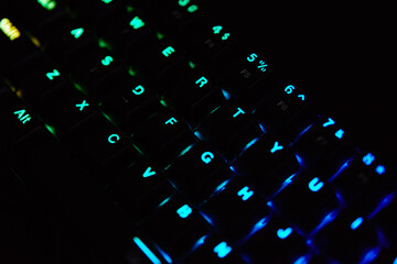 Fototapete - Gaming keyboard, close up. Mechanical rgb keyboard for computer games on dark backgound