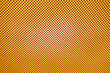 Dots on orange glass abstract pattern.
