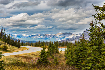 Wall Mural - The road to snow-capped mountains