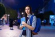 © BillionPhotos.com - Young attractive woman student walking around the city