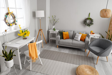 Wall Mural - Interior of room with sofa, workplace and Easter decor