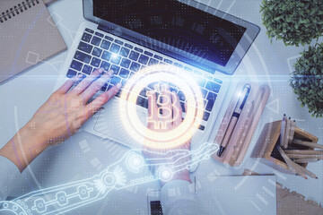 Poster - Double exposure of woman hands working on computer and blockchain theme hologram drawing. Top View. bitcoin cryptocurrency concept.