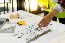 Engineers Are Designing Houses For Architectural Projects. Engineering Tools At Work Architects Calculate And Draft Building Construction Drawings, Civil Engineering, Architect Concepts.