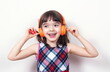 © gmstockstudio - Little girl using the earphones