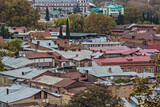 Fototapeta Młodzieżowe - Aerial view of Old Tbilisi from Narikala Fortes. Sunny day in Tbilisi, Georgia