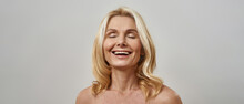 Middle Aged Caucasian Woman Laugh With Closed Eyes
