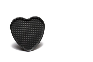 Closeup heart cake pan bottom white background