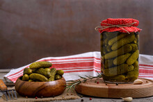 Pickles In A Wooden Bowl And Jar