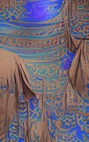 Fototapeta Paryż - Fabric folds ethnic ornament boho folk clothes