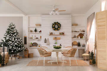 Canvas Print - Cozy dining room interior with Christmas tree and festive decor