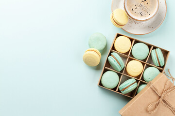 Wall Mural - Homemade macaroons in gift box and coffee