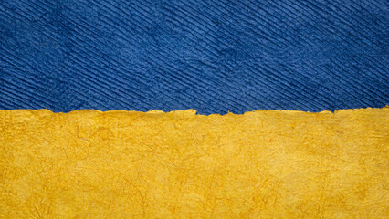 paper abstract in colors of Ukrainian national flag - blue and yellow, set of textured, handmade, bark paper sheets