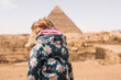 GIRL BABY TOURIST TRAVEL IN DESERT