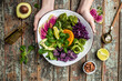 Healthy vegetarian buddha bowl salad with halloumi cheese, avocado, cucumber, chickpeas, watermelon radish, potato purple sweet. ketogenic paleo diet. Clean eating, vegan food concept. top view