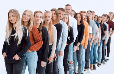 group of diverse young people standing in line.