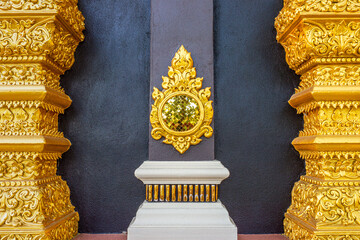 Wall Mural - Religion art of Thai Buddhism on outside temple wall of Wihan Somdet Ong Pathom. The building is at Wat Phra That Doi Phra Chan on the top hill of Doi Phra Chan mountain in Mae Tha, Lampang, Thailand.