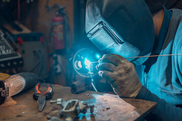 Wall Mural - TIG welding of aluminum part for a passenger car