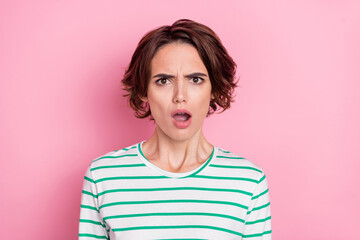 Poster - Portrait of attractive worried brunette girl sudden bad news reaction isolated over pink pastel color background