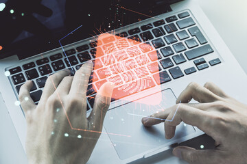 Poster - Multi exposure of abstract fingerprint scan interface with hands typing on computer keyboard on background, digital access concept