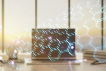 Poster - Double exposure of technology hologram with hexagon on laptop background. Research and development software concept