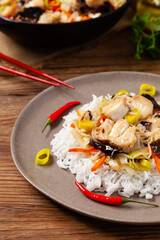 Wall Mural - Chinese style cod, served on a plate with white rice.