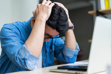 Sticker - Young Asian man working at office