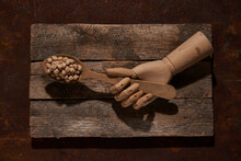 Wooden Hand With Spoon Of Raw Healthy Chickpeas Seeds